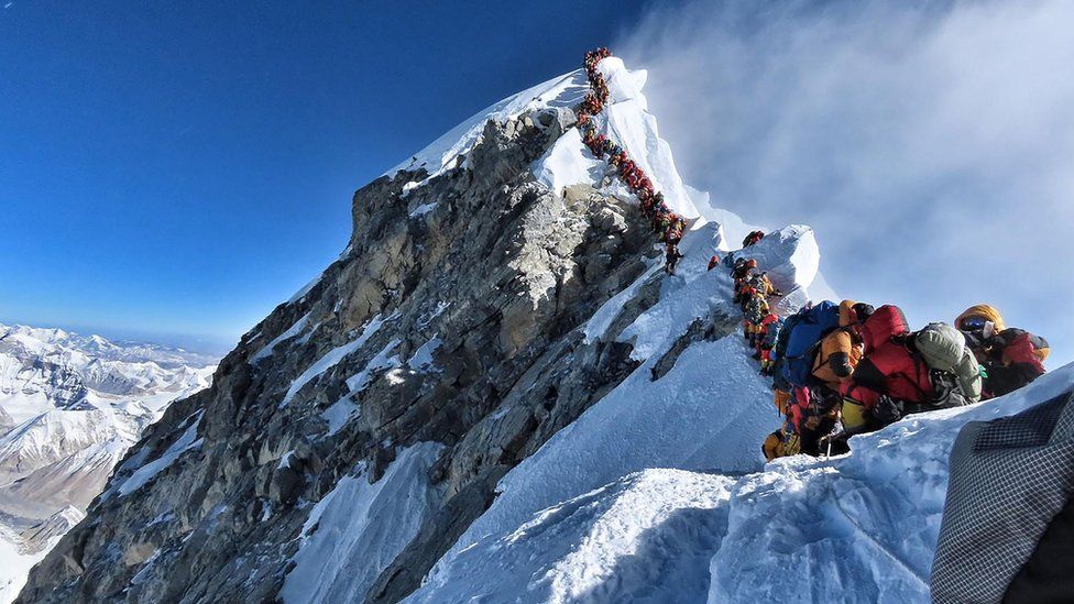 Spring climbing season begins as the Sherpas fix ropes on highest peak